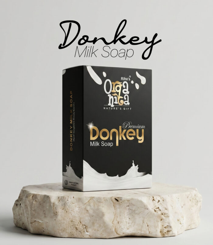 Rihas Organica Premium Donkey Milk Soap displayed on a stone pedestal, highlighting its nourishing and moisturizing skincare benefits.