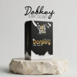 Rihas Organica Premium Donkey Milk Soap displayed on a stone pedestal, highlighting its nourishing and moisturizing skincare benefits.